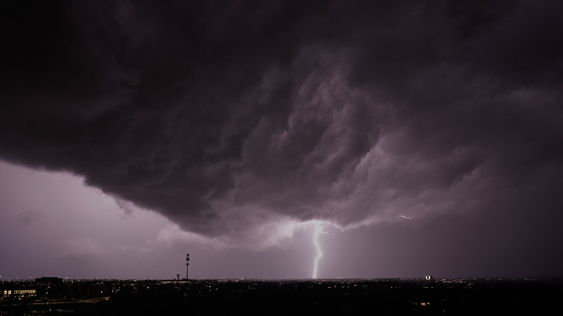 
                                Lightning flashes as a storm clouds pass over Lenexa, Kansas
                            