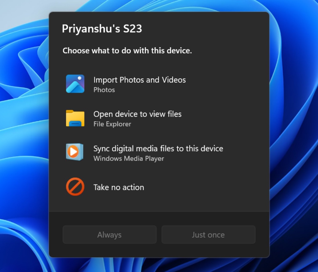 The redesigned Windows 11 AutoPlay dialog box in dark mode, showing action options for a connected device named &amp;quot;Priyanshu's S23.&amp;quot;