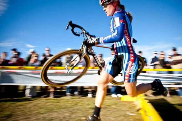 Katie Compton (Planet Bike) looking smooth heading through the barriers.