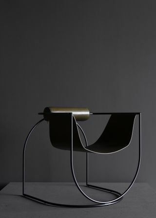 Lemni armchair on grey background, one of the best minimalist designs in Wallpaper* Design Awards 2022