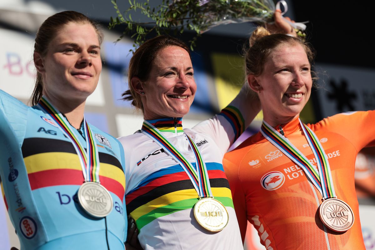 Picture by Alex Whitehead/SWpix.com - 05/10/2024 - Cycling - 2024 UCI Gravel World Championships, Halle-Leuven, Belgium - Women Elite Race - Marianne Vos (Netherlands) wins the 2024 UCI Gravel World Championships receiving the Gold Medal and World Champions Jersey with Lotte Kopecky (Belgium) in second and Lorena Wiebes (Netherlands) in third