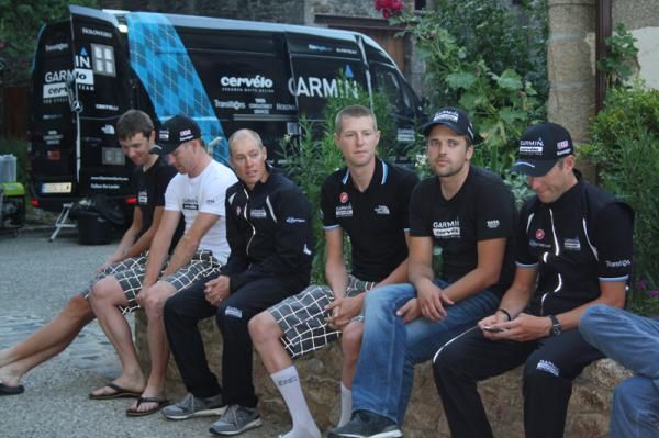 The riders gather outside the team hotel