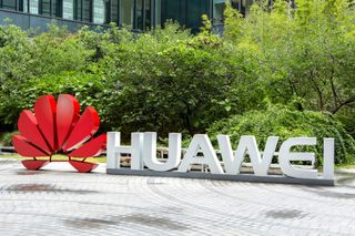 The Huawei logo displayed at Huawei University in Hangzhou, China. Credit: Rad K/Shutterstock