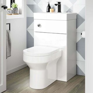 A 2-in-1 toilet and basin combination unit in gloss white