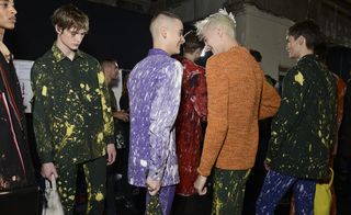 Male models wearing bleached clothing