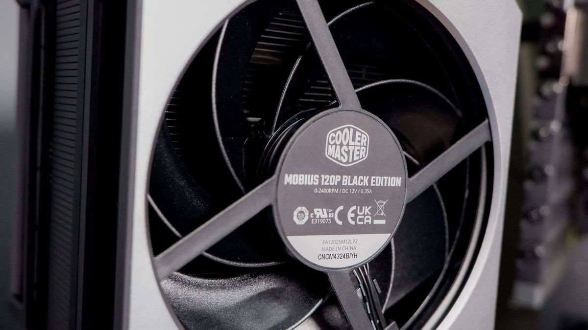 A Cooler Master Hyper 612 Apex on a desk and installed on a gaming PC.