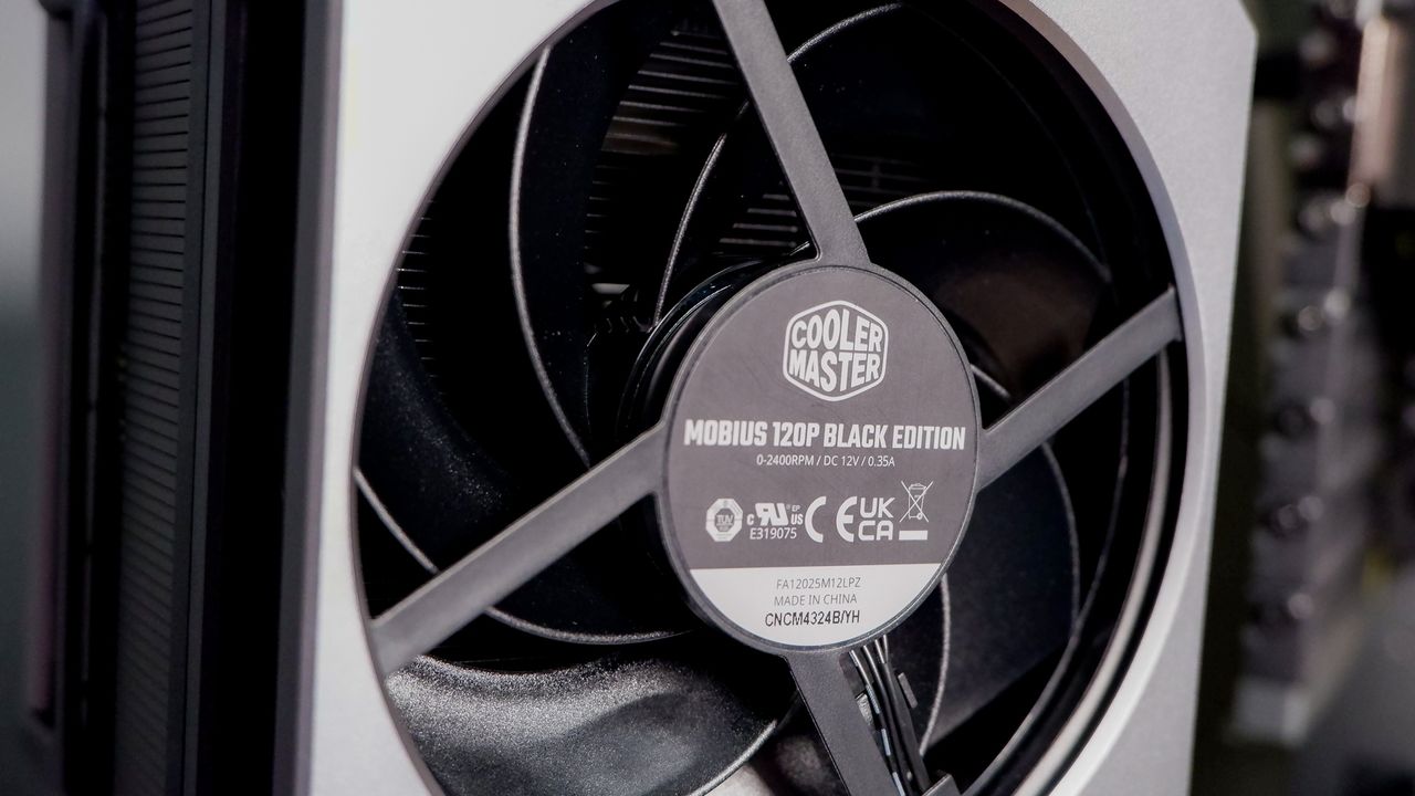 A Cooler Master Hyper 612 Apex on a desk and installed on a gaming PC.