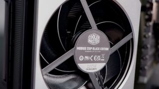 A Cooler Master Hyper 612 Apex on a desk and installed on a gaming PC.