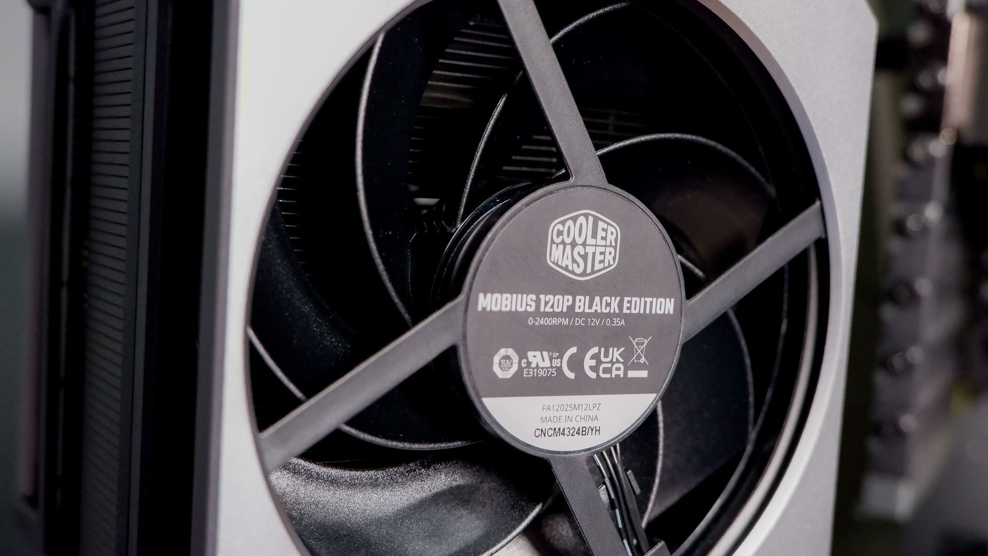 A Cooler Master Hyper 612 Apex on a desk and installed on a gaming PC.