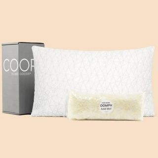 Coop home pillow on peach background