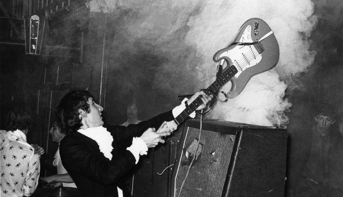 The Who&#039;s Pete Townshend smashes an unfortunate guitar against an even more unfortunate amplifier