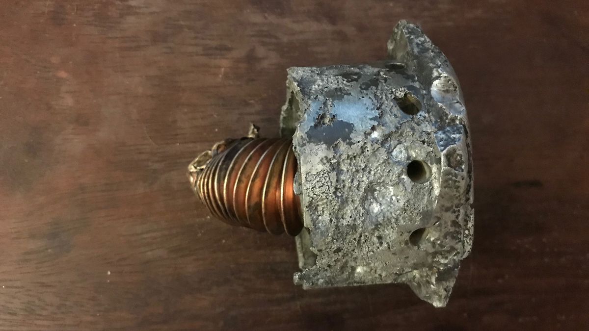 This is an oxygen feed valve to the rocket's combustion chamber. It was among more than 1,760 pounds of metal remnants of the blast recovered by the excavators.
