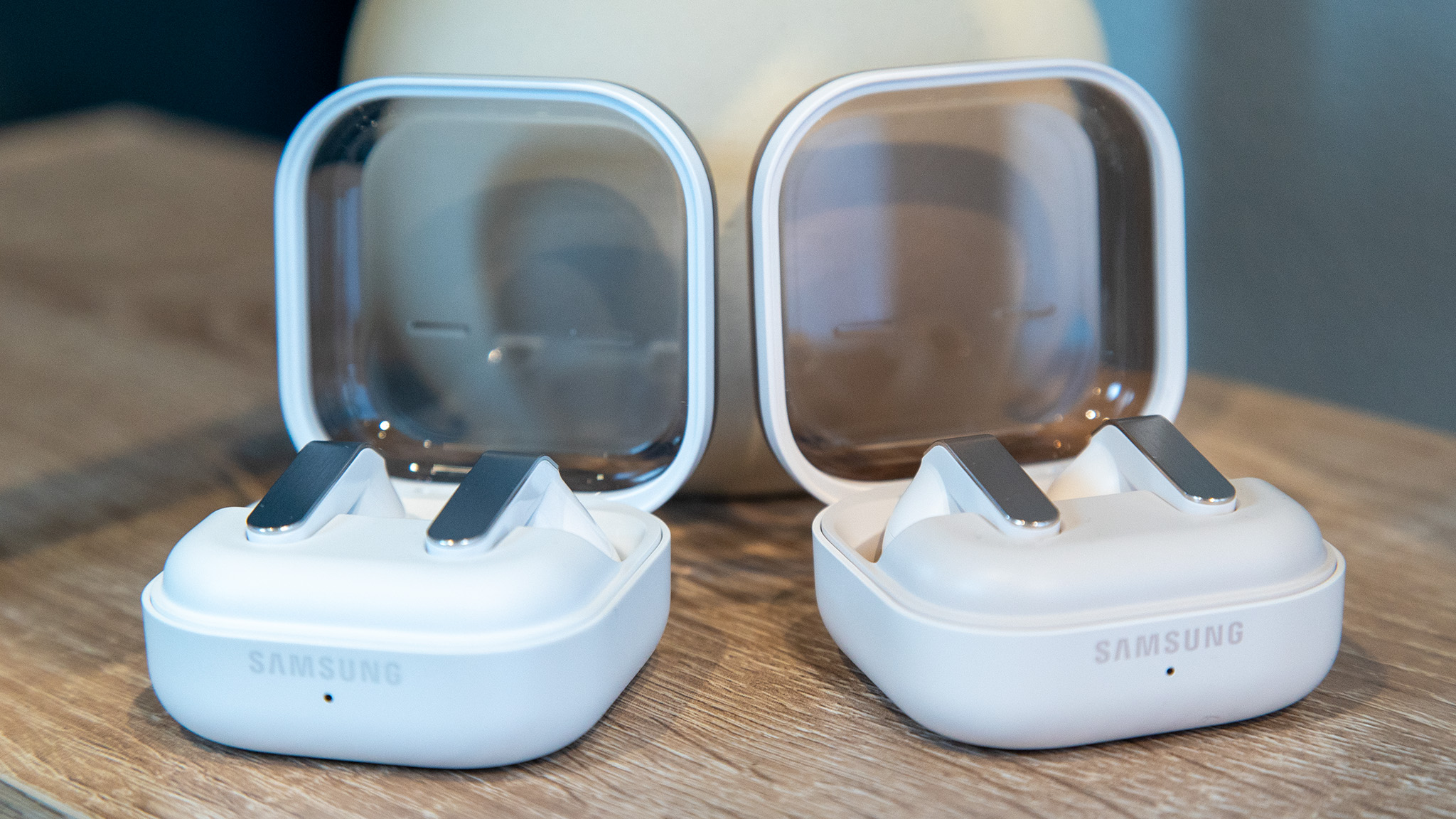 White Samsung Galaxy Buds 4 Pro with cases