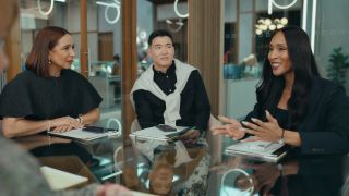 Maya Rudolph, Joel Kim Booster and Michaela Jaé Rodriguez sitting at a table in "Loot."