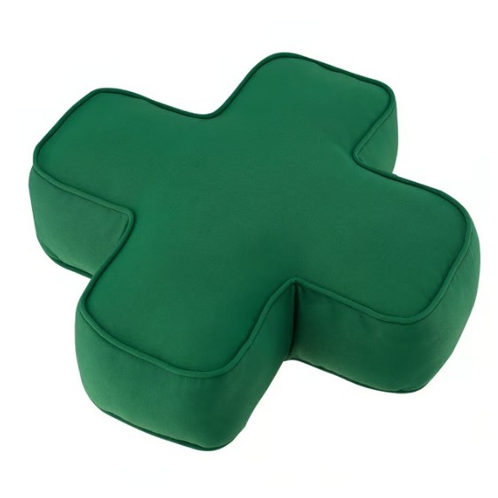 Green X shaped cushion