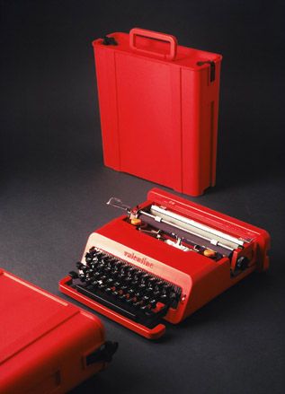 Red and black portable typewriter