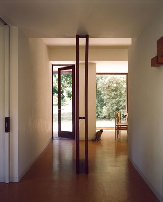 Interior of midcentury courtyard house with cork floor