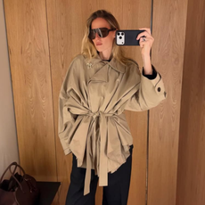 woman wearing winter to spring transitional jacket trends 2026