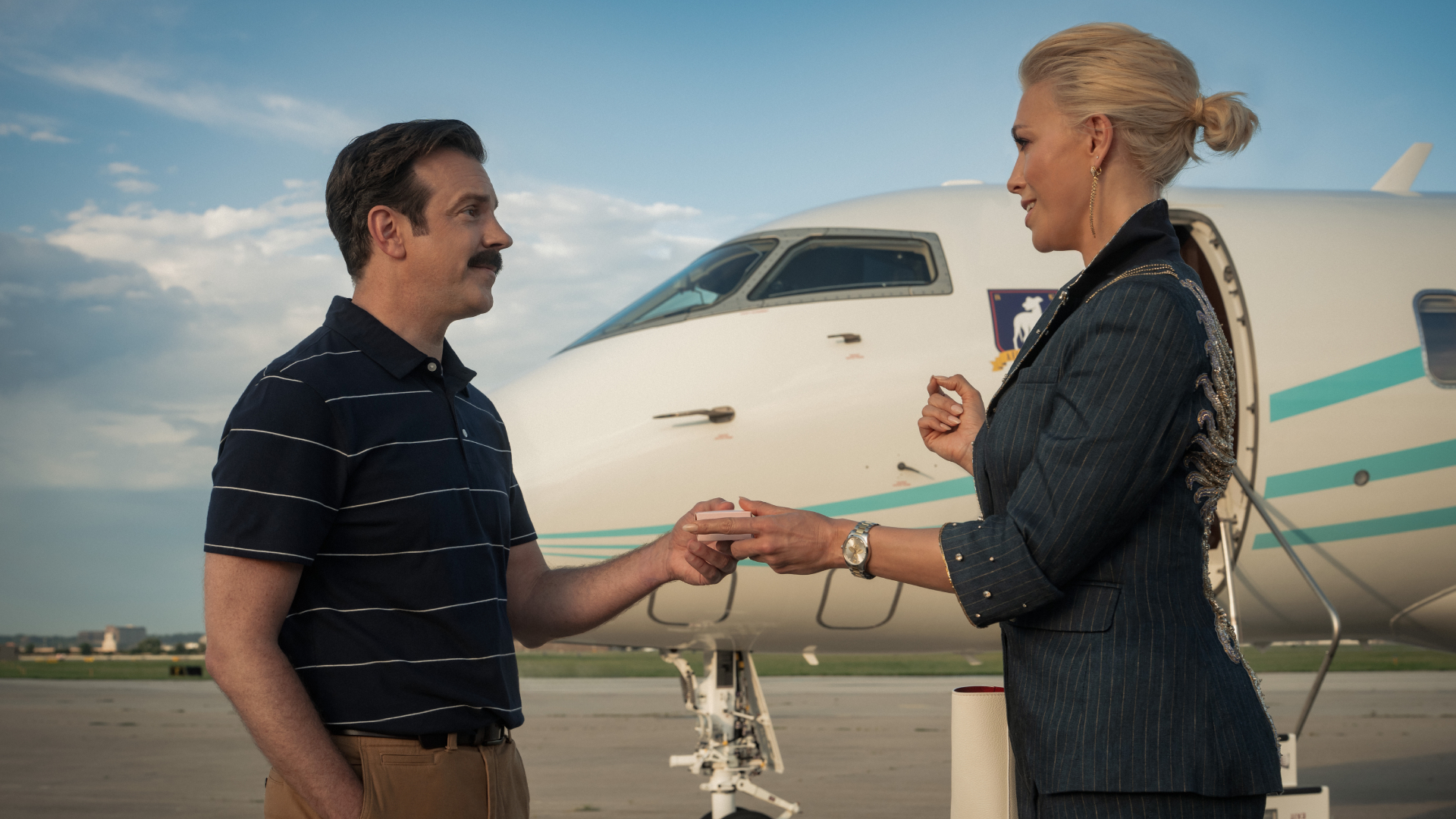 Jason Sudeikis as Ted Lasso and Hannah Waddingham as Rebecca Welton in Ted Lasso season 4
