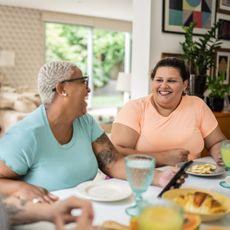 2 women sat at lunch table
