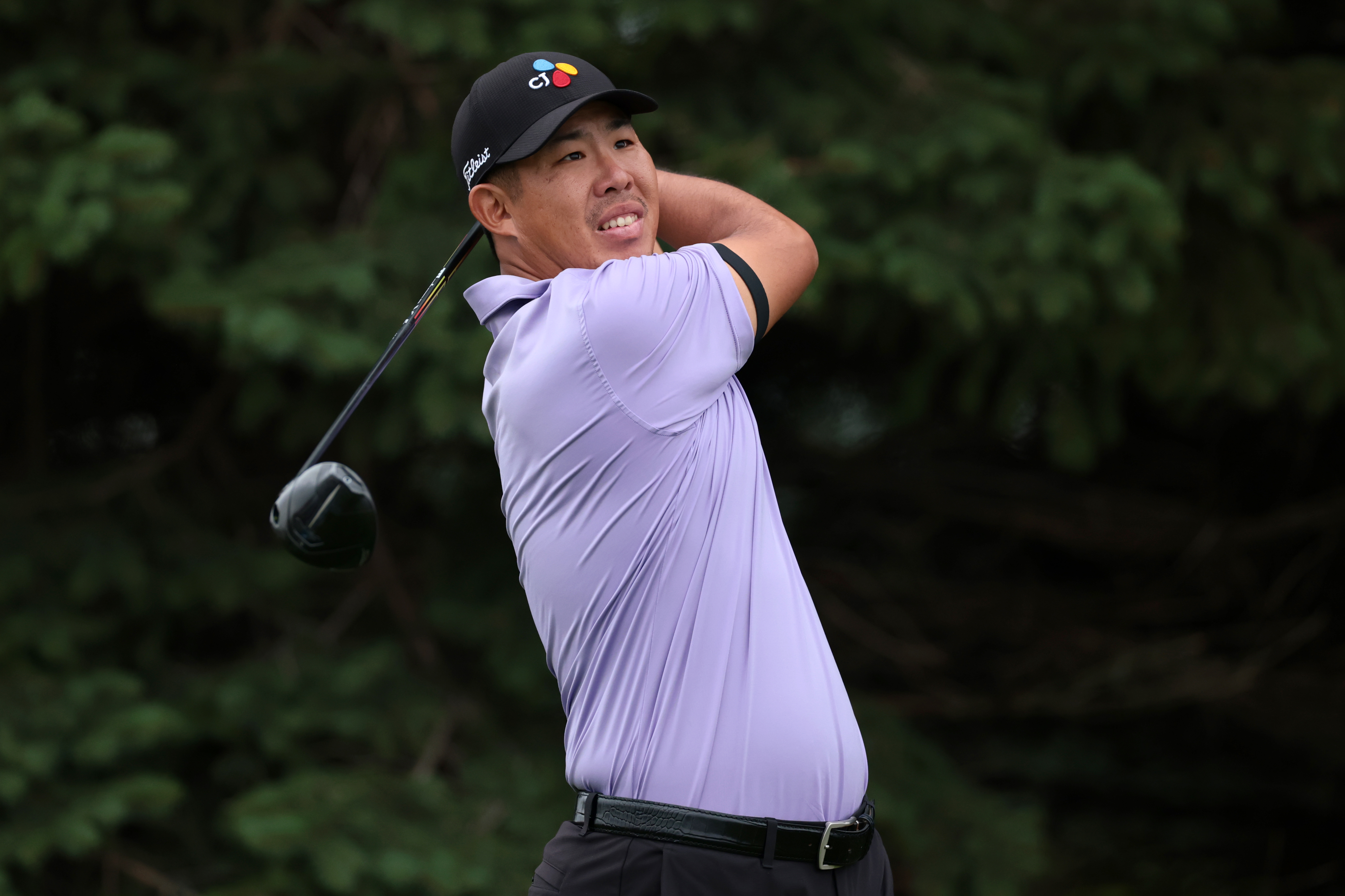 Byeong Hun An hits a driver off the tee