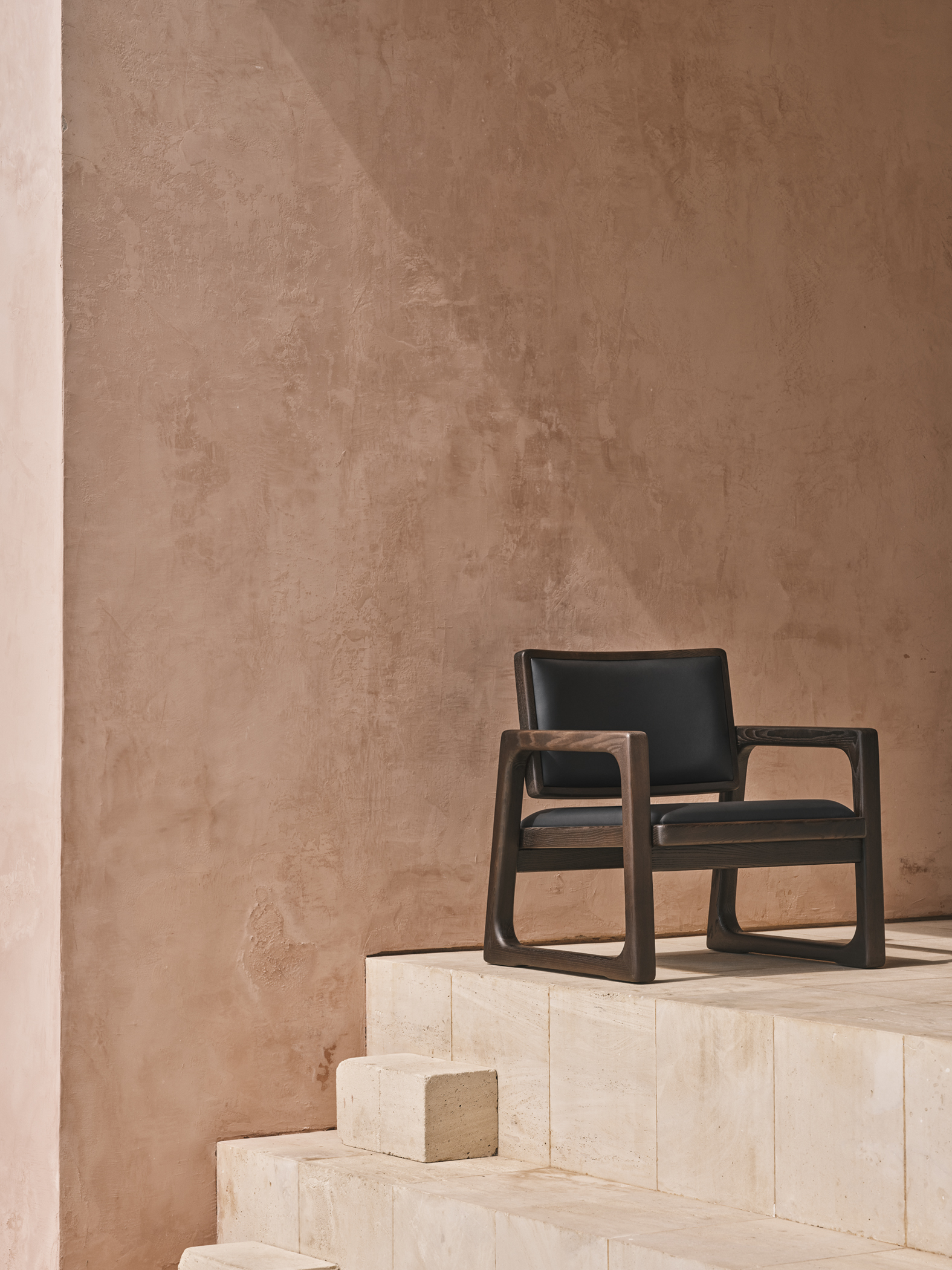 furniture arranged across minimalist interior