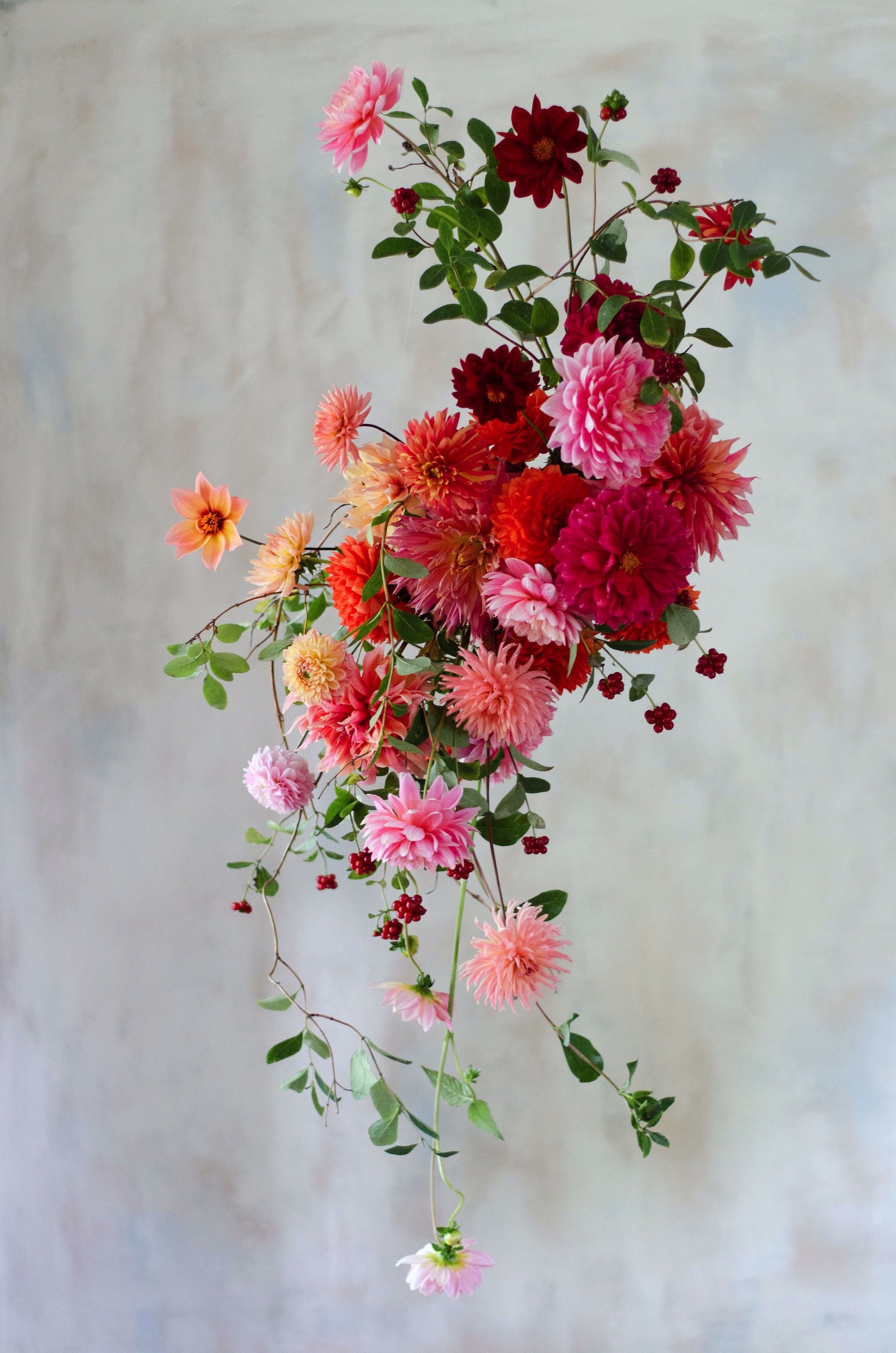 Hanging flower decor with dahlias and honeysuckle