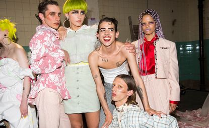Art School S/S 2018. Models dressed in skirts, dresses, makeup and wigs