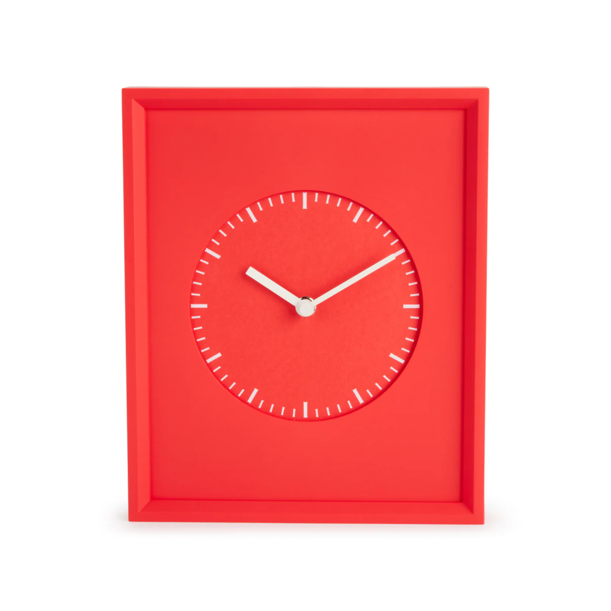 red clock with white hour and minute lines and white hands