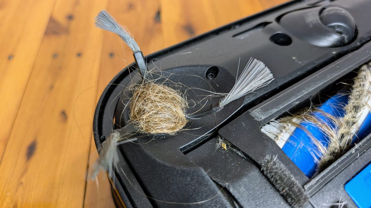 Ecovacs X5 Pro Omni hair wrapped around side brush