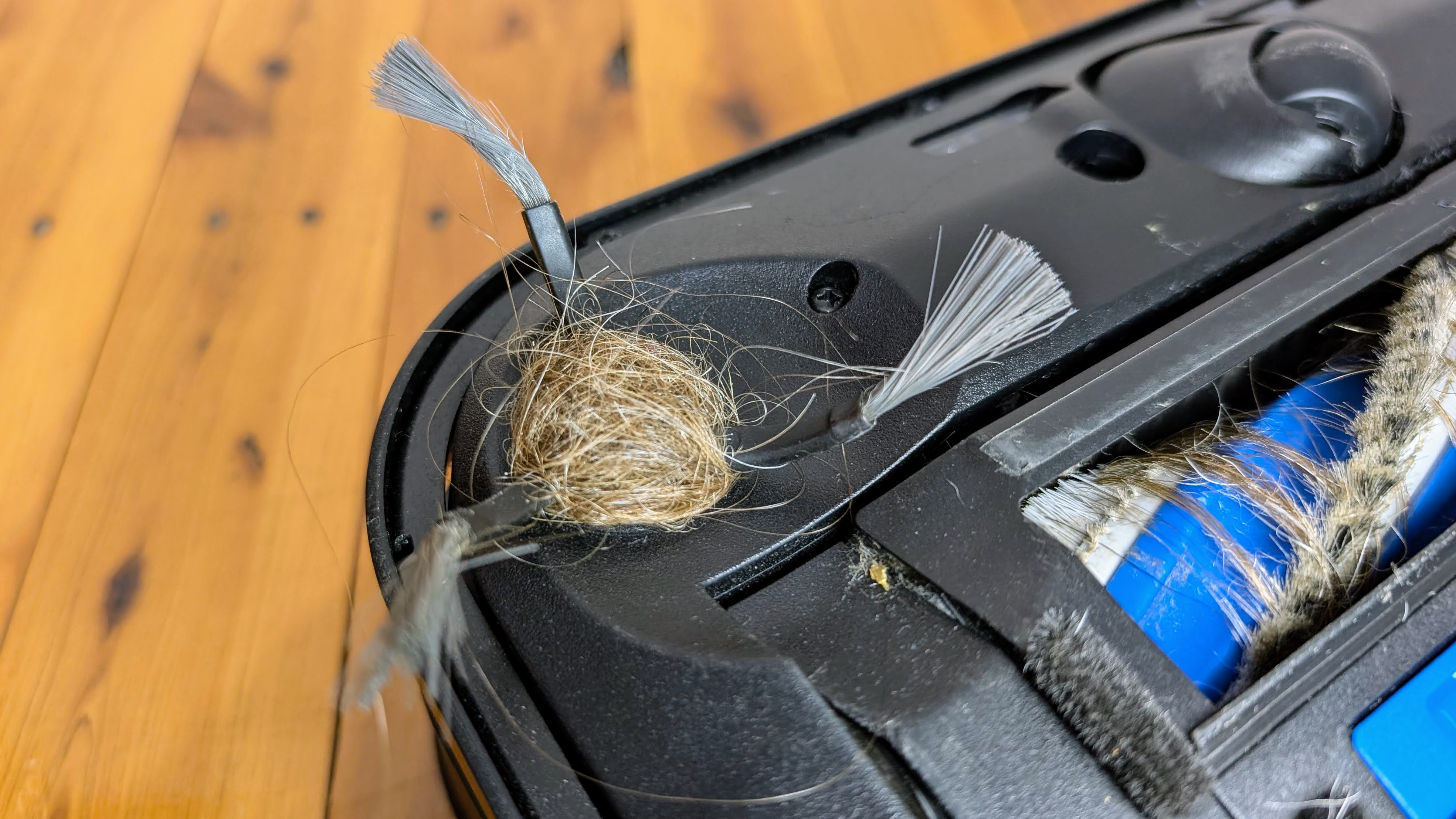Ecovacs X5 Pro Omni hair wrapped around side brush