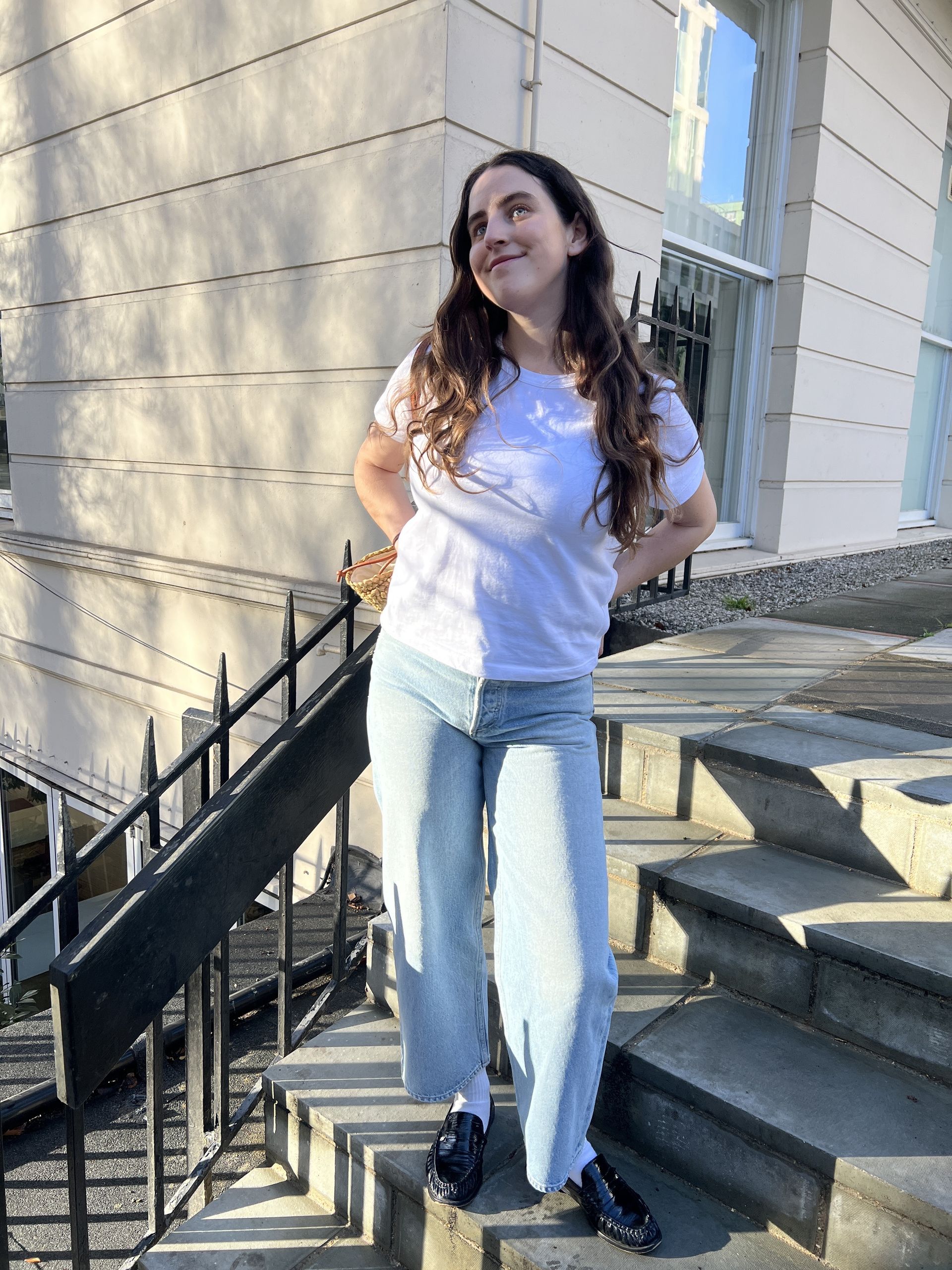 An image of Who What Wear UK's Ava Gilchrist wearing the Agolde Arc jeans.