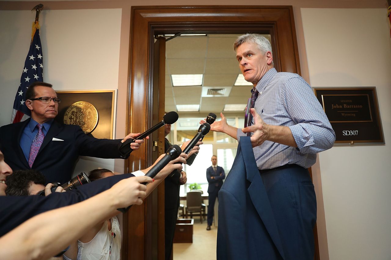 Sen. Bill Cassidy faces the press.