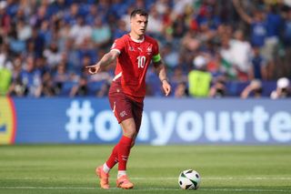 Switzerland Euro 2024 squad Granit Xhaka of Switzerland controls the ball during the UEFA EURO 2024 round of 16 match between Switzerland and Italy at Olympiastadion on June 29, 2024 in Berlin, Germany. (Photo by Alex Grimm/Getty Images)