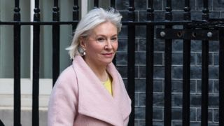 A close up photo of Secretary of State for Digital, Culture, Media and Sport Nadine Dorries, as she walks outside Number 10 Downing Street