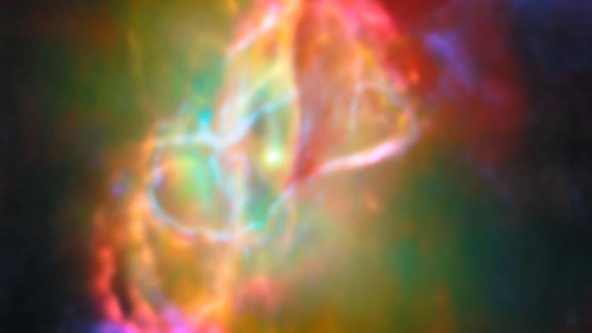 在新的詹姆斯·韦伯太空望远镜蝴蝶星云图像中一个死去的“太阳”形成系外行星的构建块 A glow of rainbow lights shines from the Butterfly nebula into the darkness of space