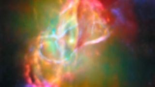 A glow of rainbow lights shines from the Butterfly nebula into the darkness of space