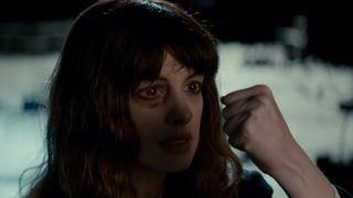 Anne Hathaway's character Gloria grabs hold of her tormenter in Colossal