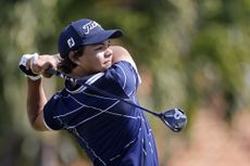 Charlie Woods, son of Tiger Woods, hits a tee shot during pre-qualifying for The Cognizant Classic in The Palm Beaches at Lost Lake Golf Club on February 22, 2024