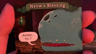 Neow's blessing card from Slay the Spire the board game