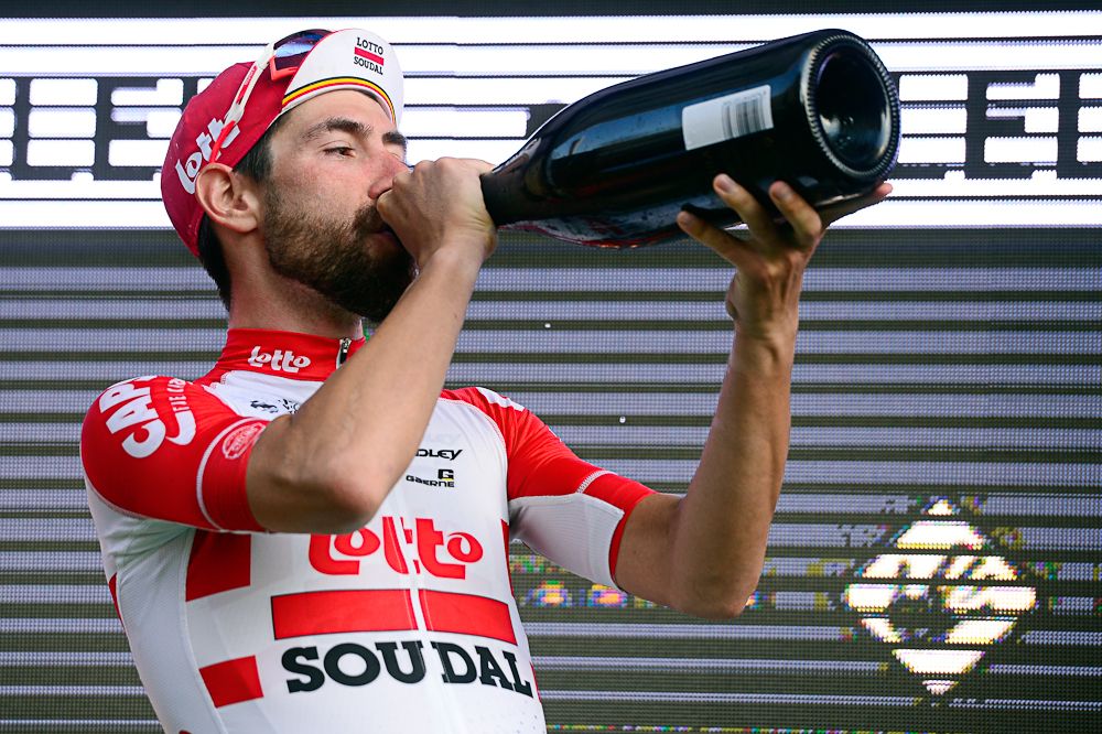 Thomas De Gendt celebrates on the podium after winning stage 1 at Volta a Catalunya