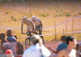 The crowd watched Nino Schurter pull away from Julien Absalon on the large TV at the finish