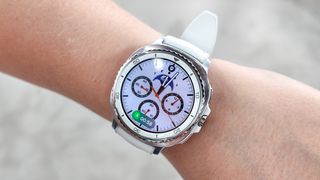 Close-up of the Samsung Galaxy Watch 8 Classic on the writer's wrist