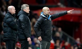Guardiola, right, shouts instructions during the first leg