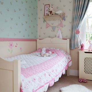 kids bedroom with floral wall