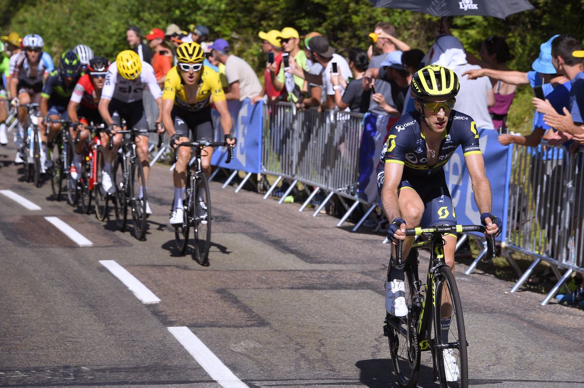 Simon Yates (Orica-Scott) riding away from Geraint Thomas