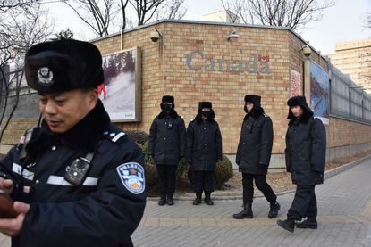 Chinese police guard Canadian embassy