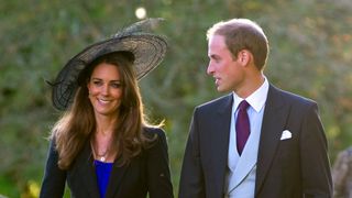 Kate Middleton and Prince William attend Harry Meade & Rosie Bradford's wedding at the Church of St. Peter and St. Paul on October 23, 2010 in Northleach near Cheltenham, England