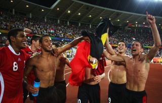 Belgium players celebrate victory over Italy in the quarter-finals of the men's football tournament at the 2008 Olympics in Beijing.