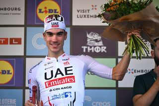 DIFFERDANGE LUXEMBOURG SEPTEMBER 21 Juan Ayuso of Spain and UAE Team Emirates celebrates at podium as stage winner during the 84th Tour de Luxembourg 2024 Stage 4 a 155km individual time trial stage from Differdange to Differdange UCIWT on September 21 2024 in Differdange Luxembourg Photo by Tim de WaeleGetty Images